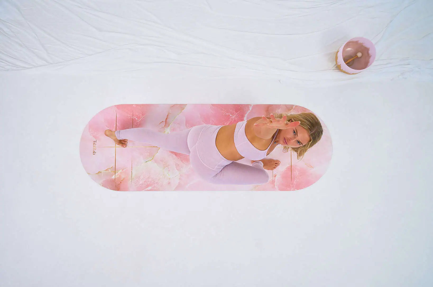 Woman practicing hot yoga on moisture activated non slip suede yoga mat