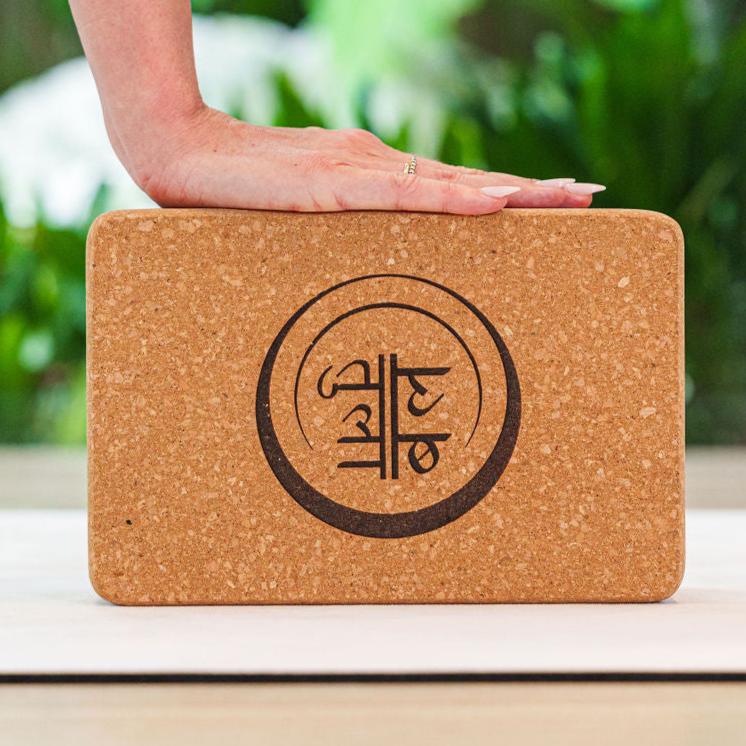 Sustainable cork yoga block with smooth finish and luxury-quality texture for comfort.