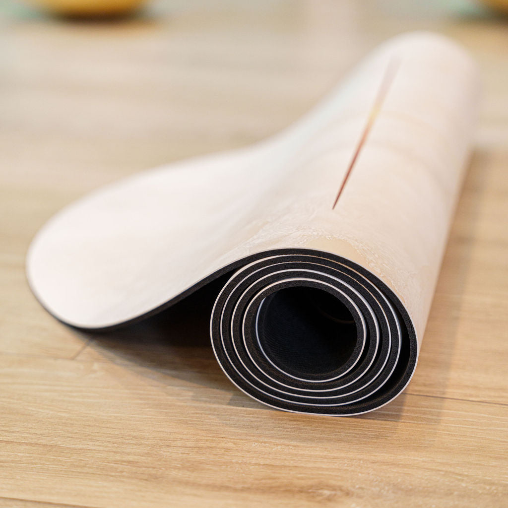 Eco yoga mat featuring coconut PU surface and elegant designer-inspired details.