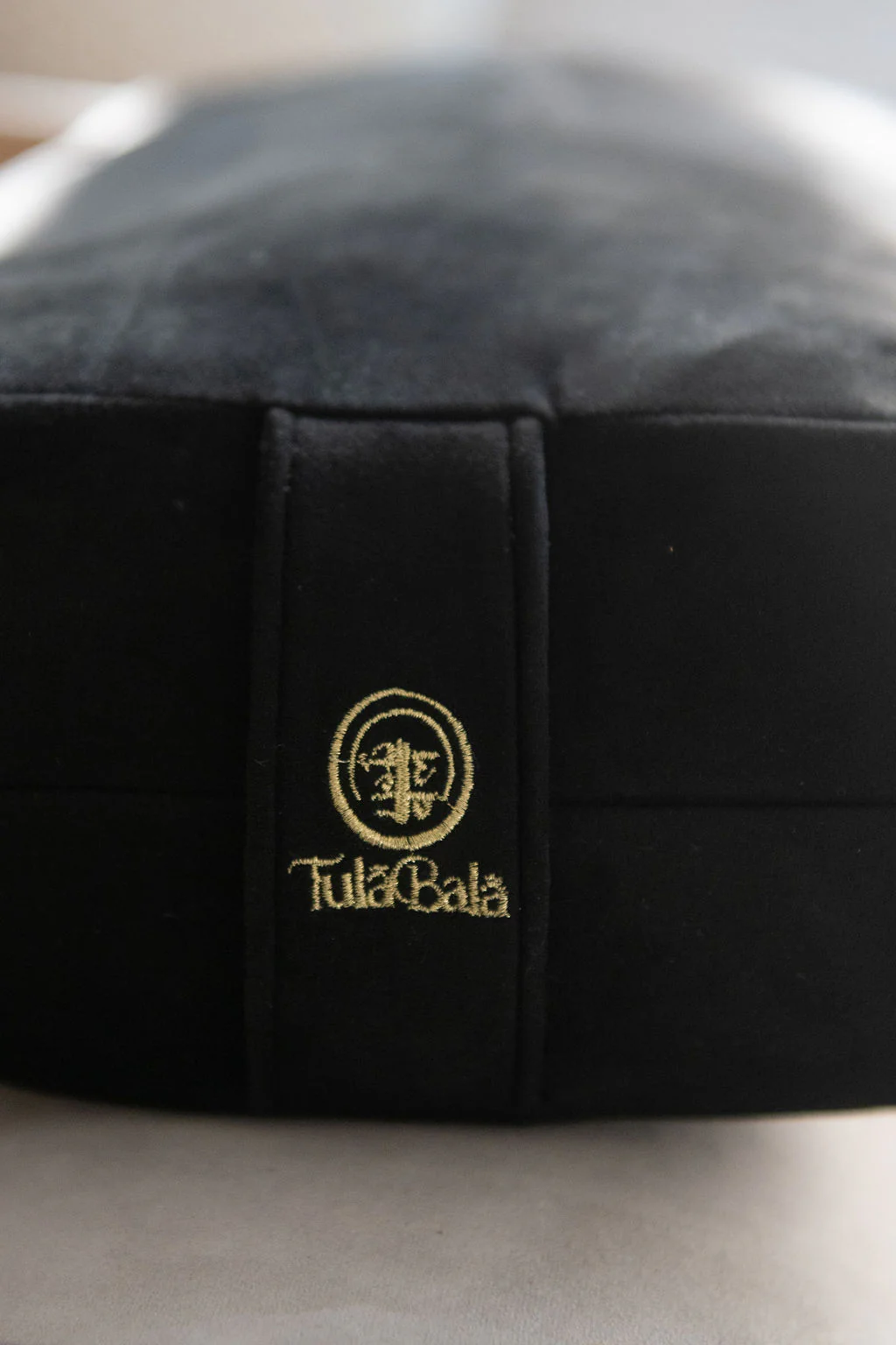 High end yoga bolster featuring durable stitching and sustainable craftsmanship.