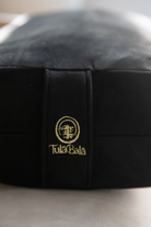 High end yoga bolster featuring durable stitching and sustainable craftsmanship.