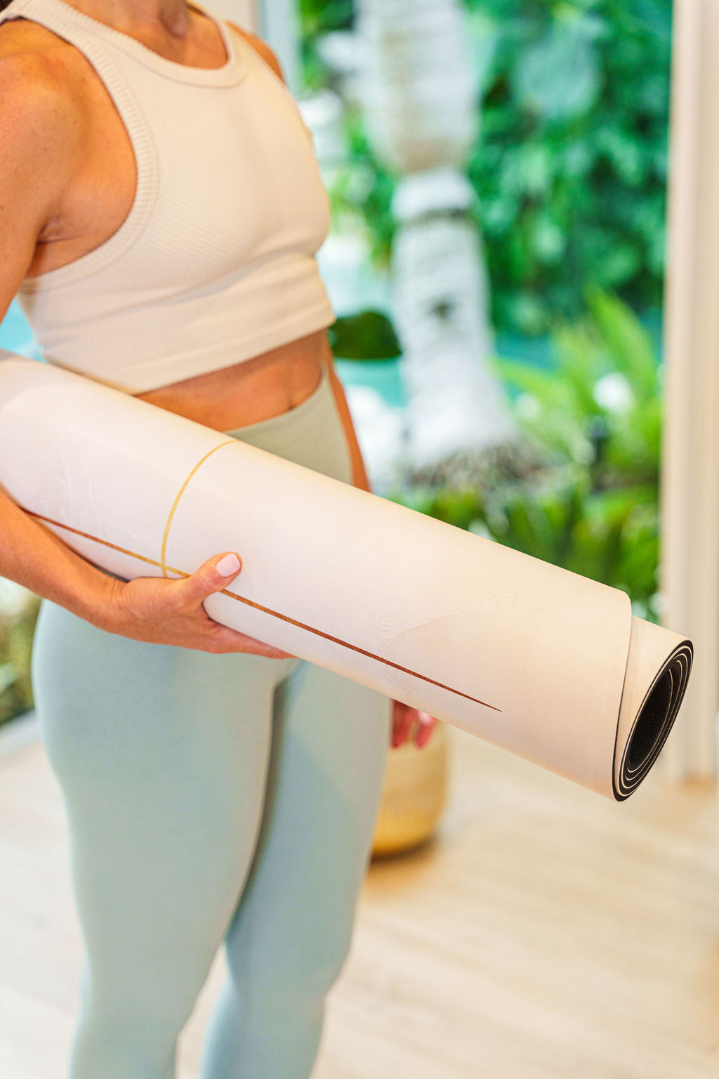 Designer yoga mat crafted from sustainable and natural materials, offering a refined non-slip surface.