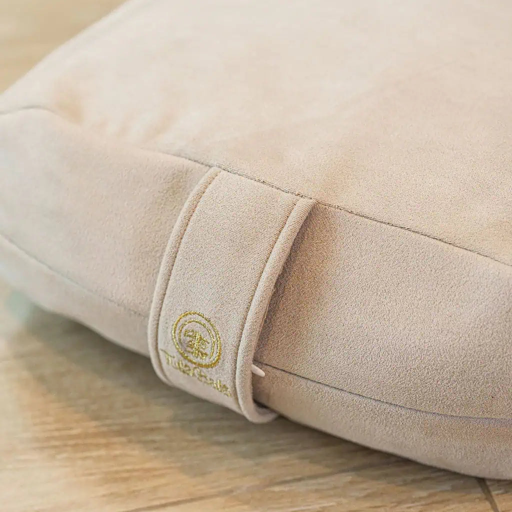 Sustainable yoga bolster with soft texture and elegant design for mindful support.