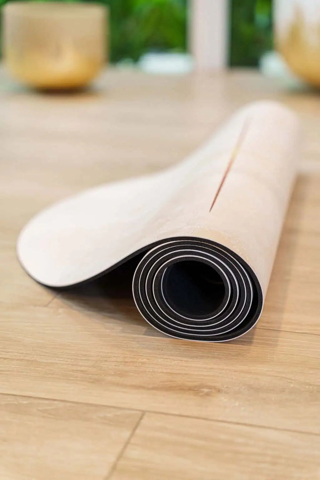Eco yoga mat featuring coconut PU surface and elegant designer-inspired details.