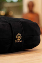 Premium yoga bolster crafted from natural cotton and eco-conscious filling for ultimate comfort.