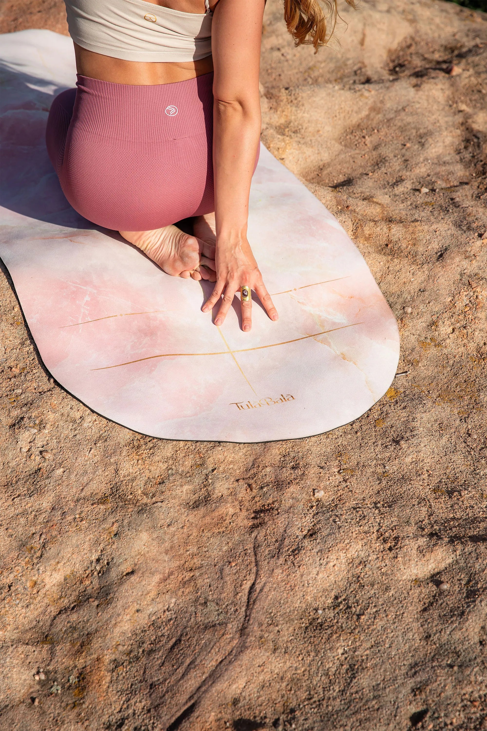 Yoga mat with alignment lines to support posture and positioning
