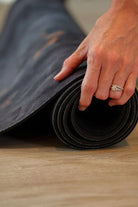 Non toxic yoga mat with natural suede surface for superior grip and elegant design.