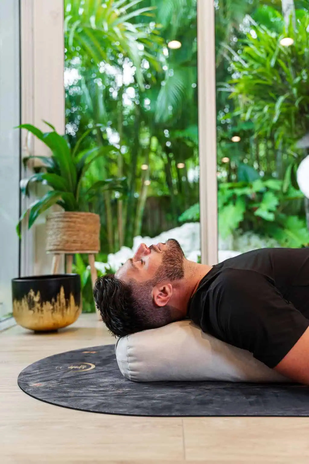 Natural yoga bolster offering ergonomic support and luxurious comfort.