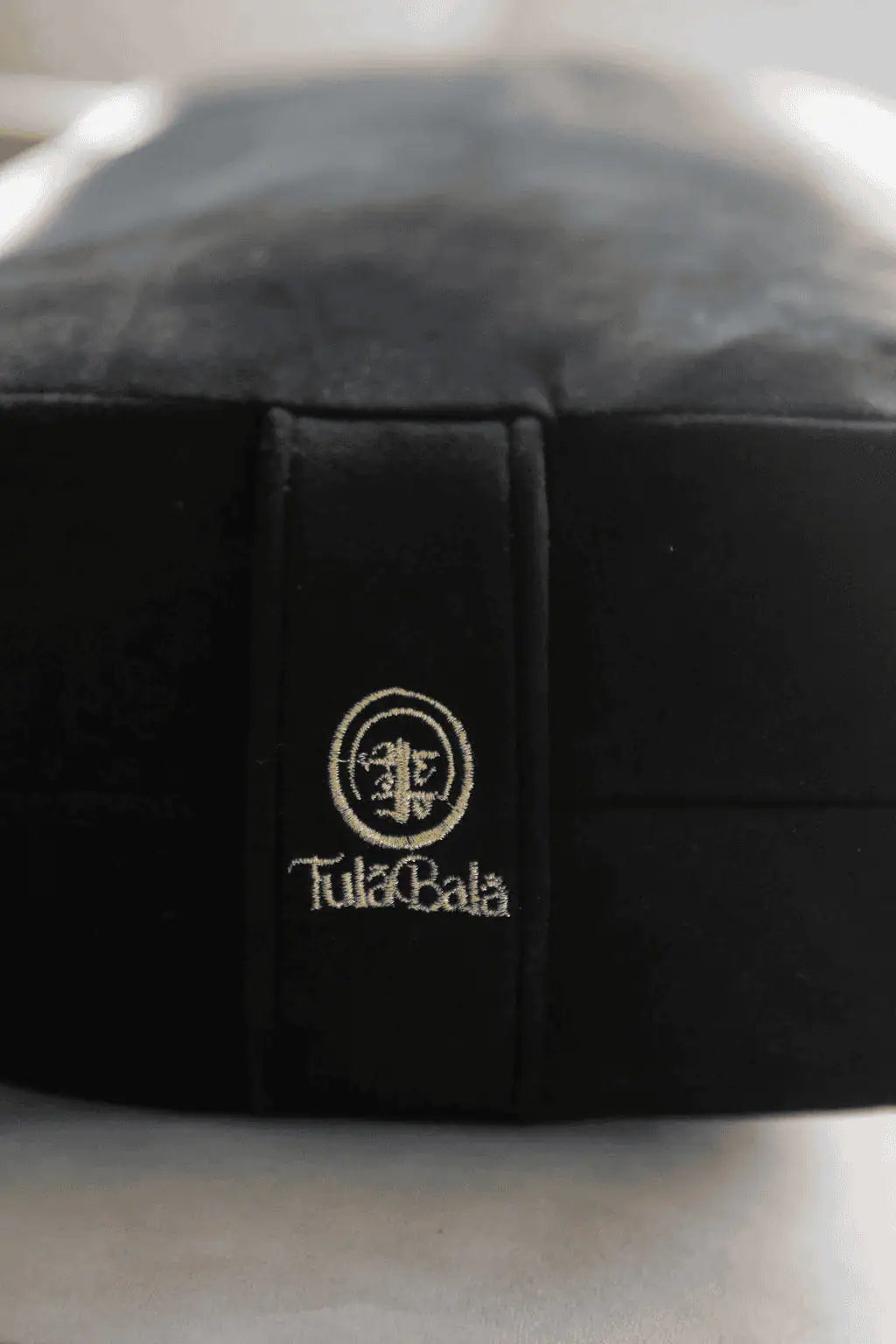 High end yoga bolster featuring durable stitching and sustainable craftsmanship.