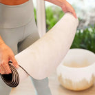 Elegant suede yoga mat for mindful practice, blending natural grip with luxury design.
