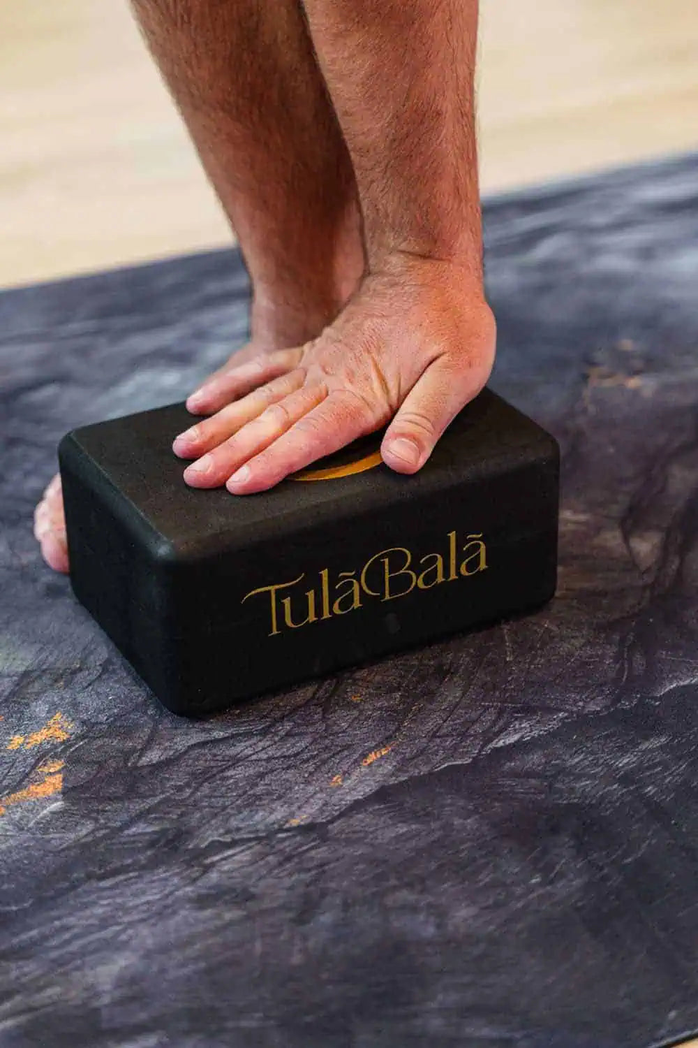 Lightweight yoga accessory with soft-touch EVA foam and ergonomic design.