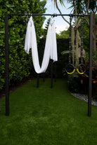 High end yoga gear featuring aerial silks crafted from durable and sustainable fabric.